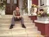 Chris sitting on the stairs at the manor